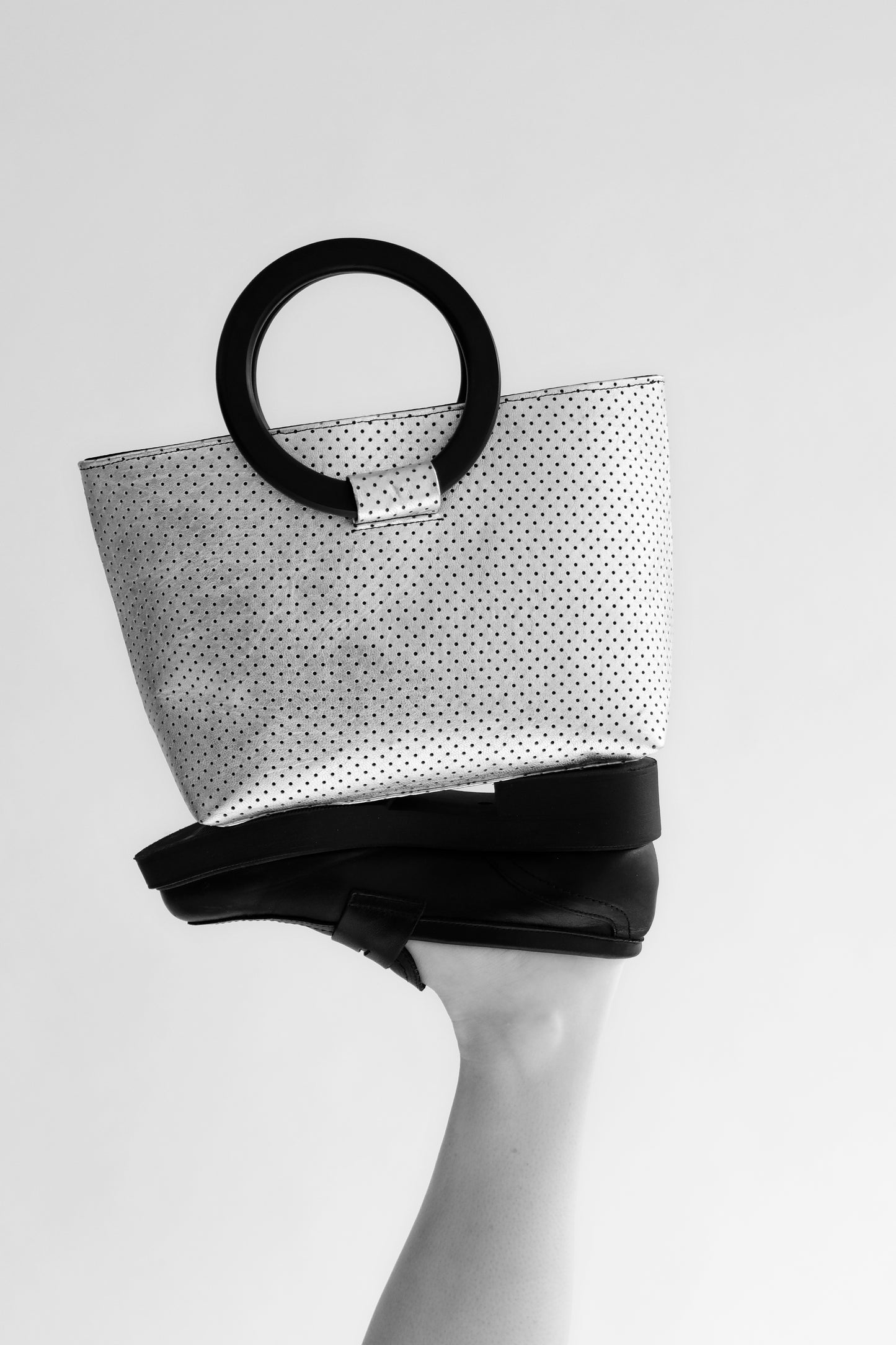 LASER CUT LEATHER STATEMENT BAG