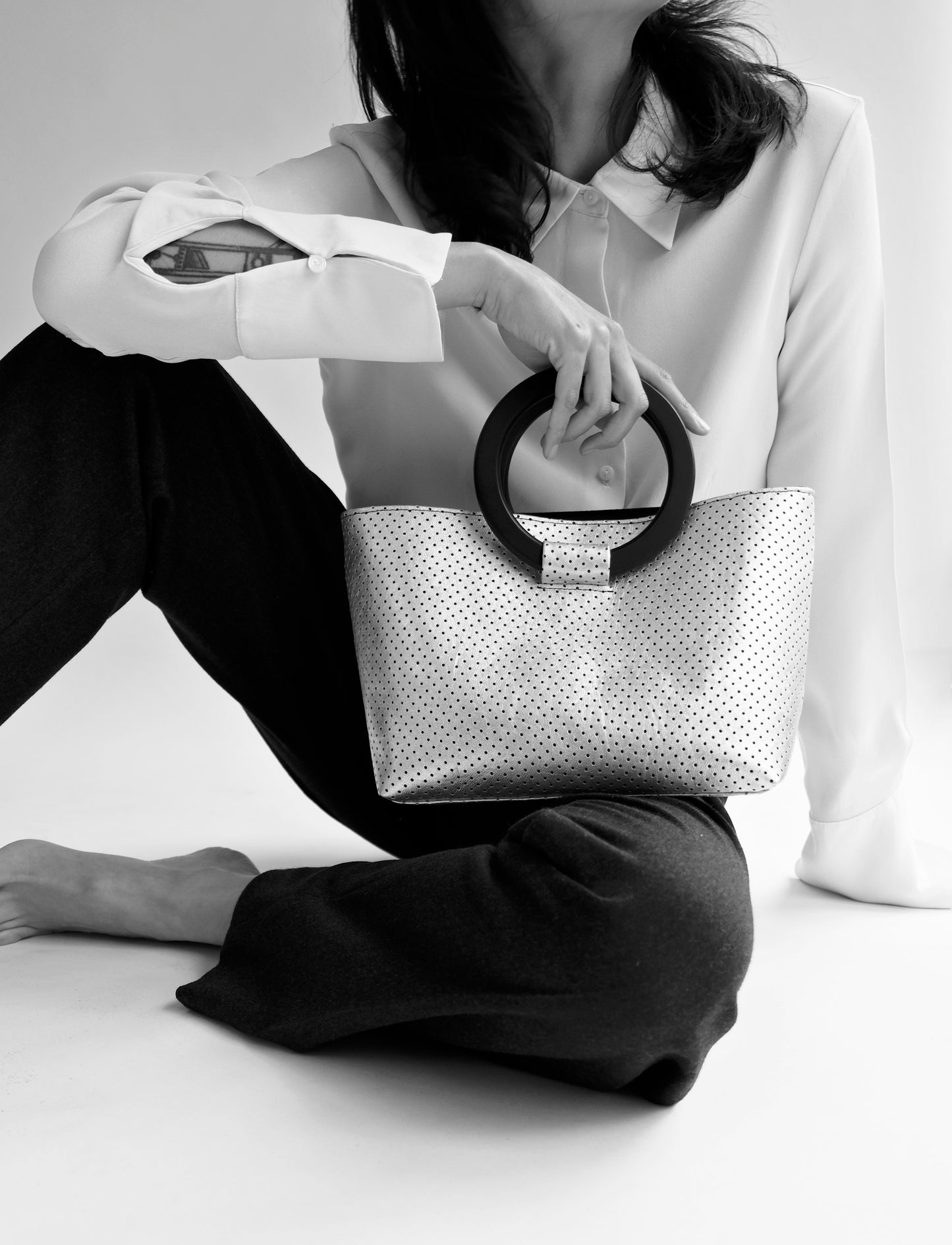 LASER CUT LEATHER STATEMENT BAG