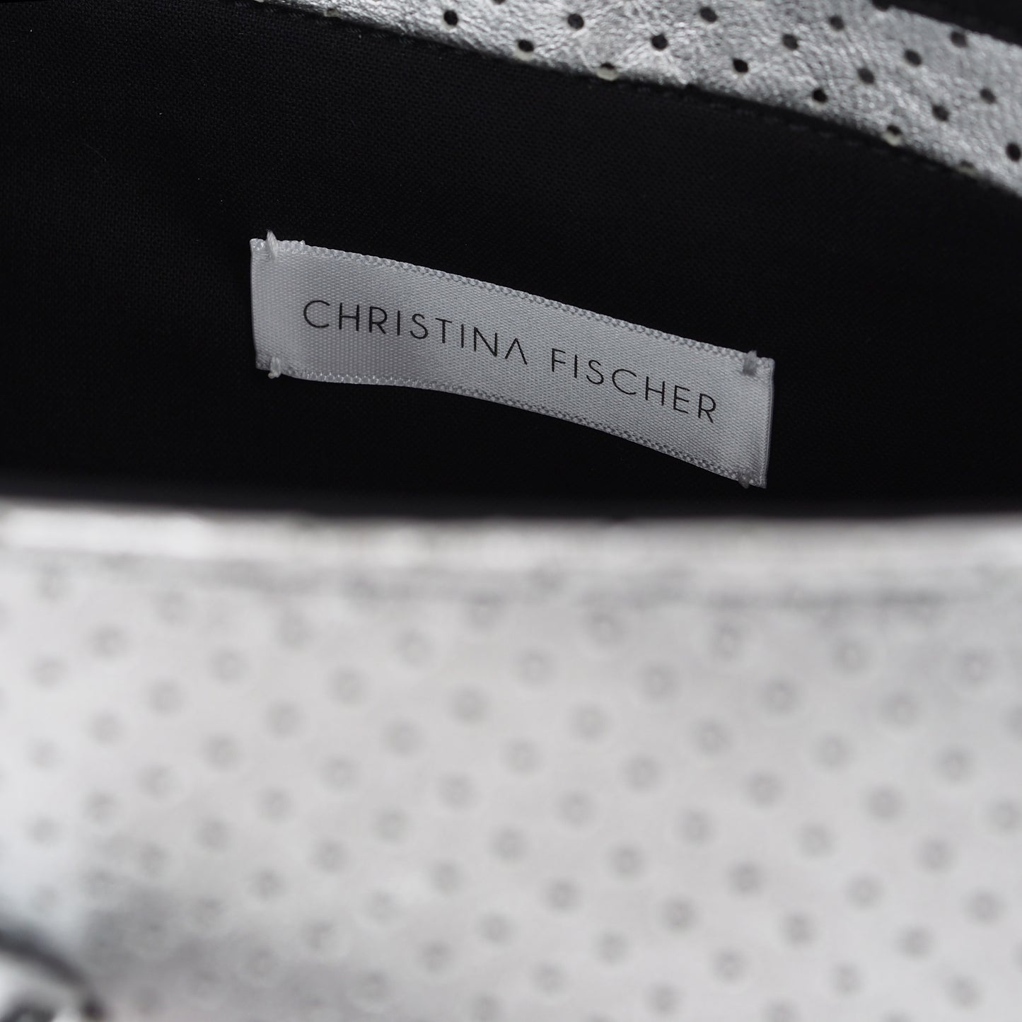 LASER CUT LEATHER STATEMENT BAG