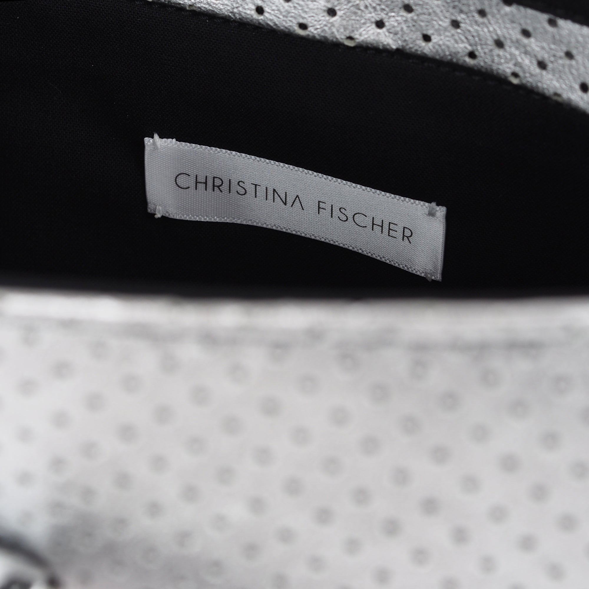LASER CUT LEATHER STATEMENT BAG